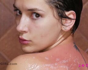 Hot teen brunette caresses sexy body in 4K Shower