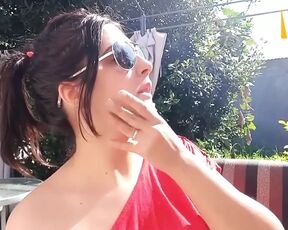 Eat Chewing Gum Outside While Showing off Your Boobs.
